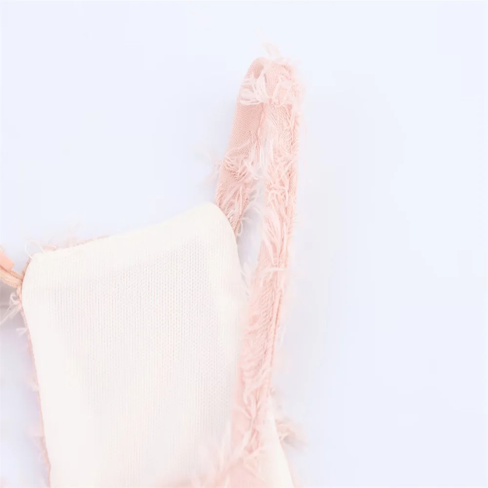 فستان ميدي صيفي جديد بنمط عصري معلق بياقة عنق بدون أكمام وشرابة مزخرفة