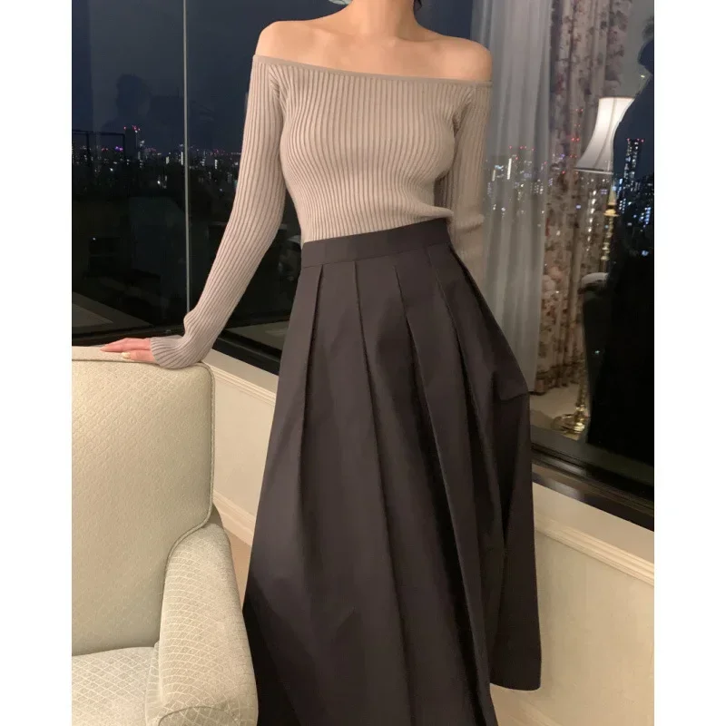 วินเทจอเนกประสงค์เกาหลีคลาสสิกกระโปรงขนาดอัปเดตพับความยาวกลางกระโปรงครึ่งวงกลมสําหรับผู้หญิงแฟชั่นชุดลําลอง