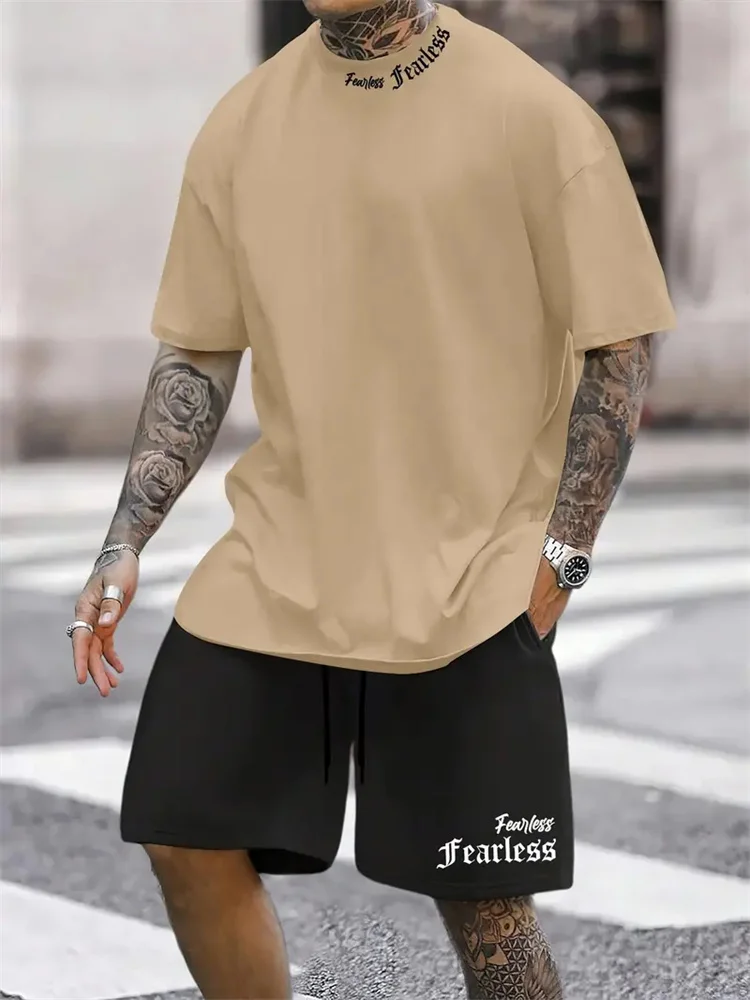 Traje con estampado de letras de Color sólido para hombre, ropa deportiva informal, camiseta de manga corta, conjunto de dos piezas de Hip-Hop