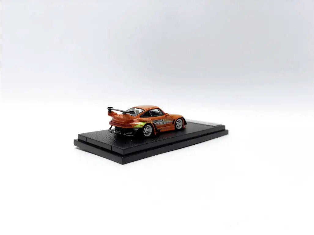 In Stock Street Warrior 1:64 RWB 993 Diecast Model Car. Vibrant orange finish with custom flame graphics, iconic widebody design