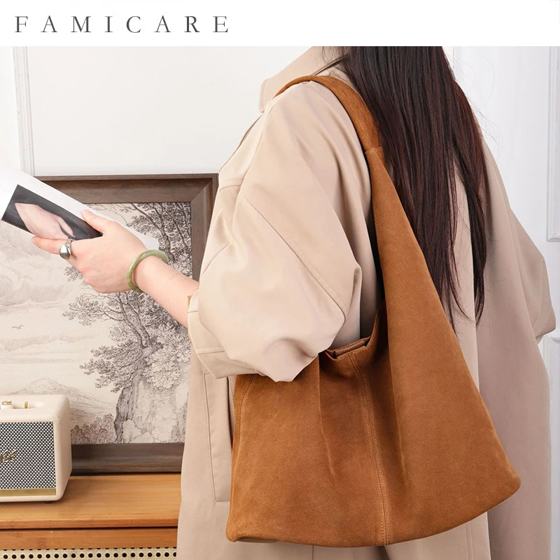 

2025 New 30 Vertical Garden Laptop Handbag Canvas Leather Spacious Shoulder Handheld Bag Women Unique Premium Light Luxury Tote