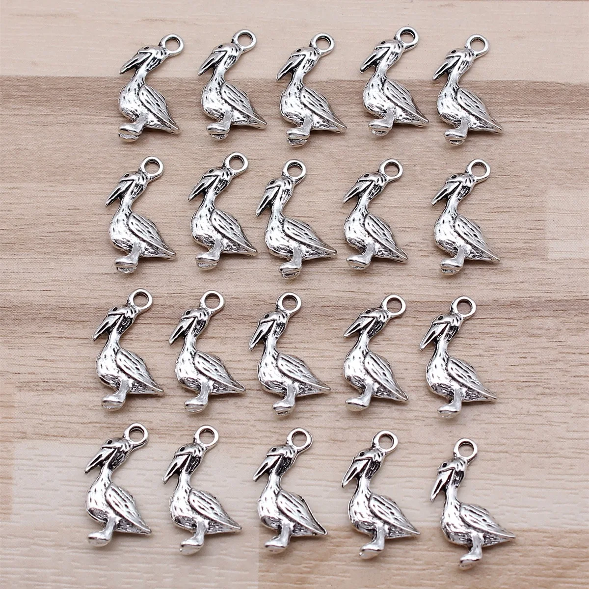 IFOCUS 20 sztuk/partia Pelikan Charms dla DIY tworzenia biżuterii stop cynku 18x9mm/0,71x0,35 cala