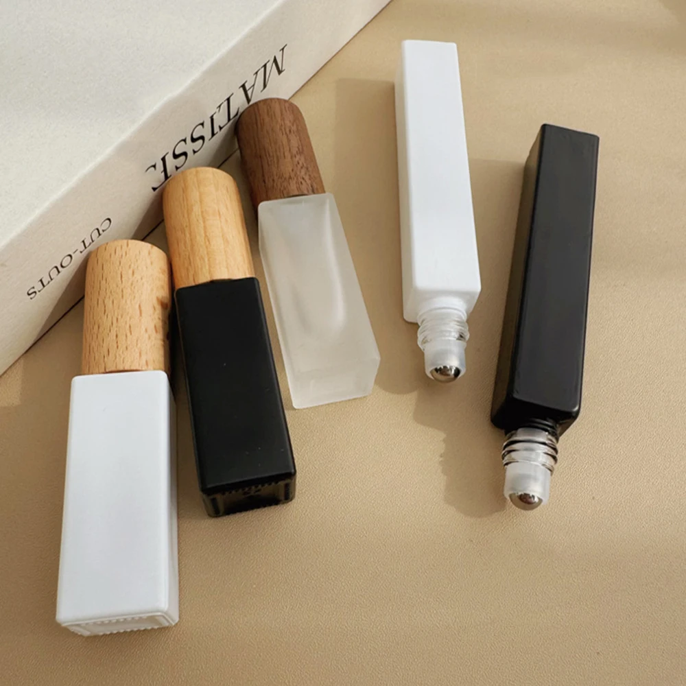 Bouchon en bois rouleau sur bouteille naturel vide rechargeable bouteille de parfum verre rouleau sur bouteilles bloquant la lumière pour huile essentielle quotidienne