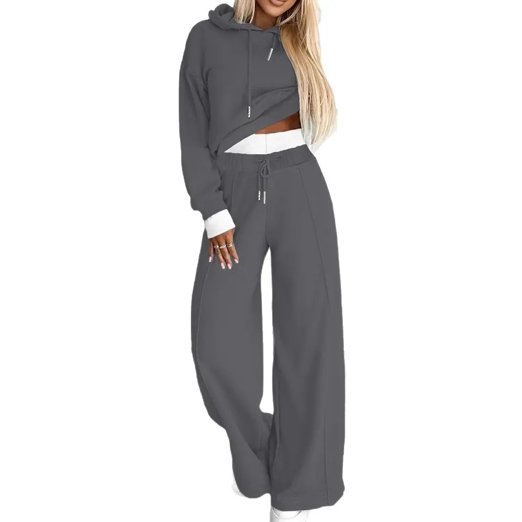 ชุดกีฬาแบบมีฮู้ดสำหรับฤดูใบไม้ร่วงและฤดูหนาวปี 2025 เสื้อแขนยาวสีพื้นแฟชั่นลำลอง กางเกงขายาวทรงกว้าง ชุดสองชิ้น