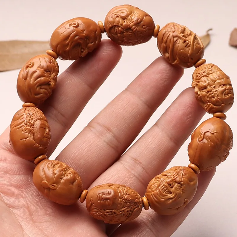 19 large seed olive pits, hand-carved, symbolizing the unity of heaven and earth, with a Buddhist monk motif, finished craft ite