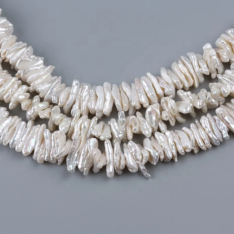 

Hot Wholesale 9*16mm White Long Biwa Freshwater Peal Beads Strand