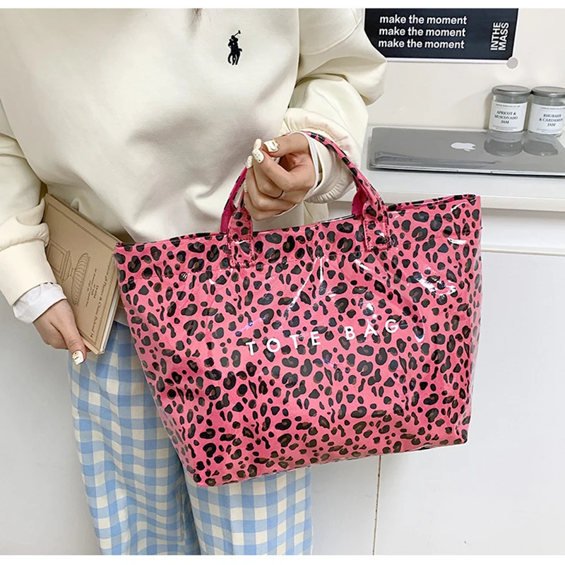 

New fashion leopard striped tote bag women large-capacity hundred handbag women unique pattern design PVC material handle bag la