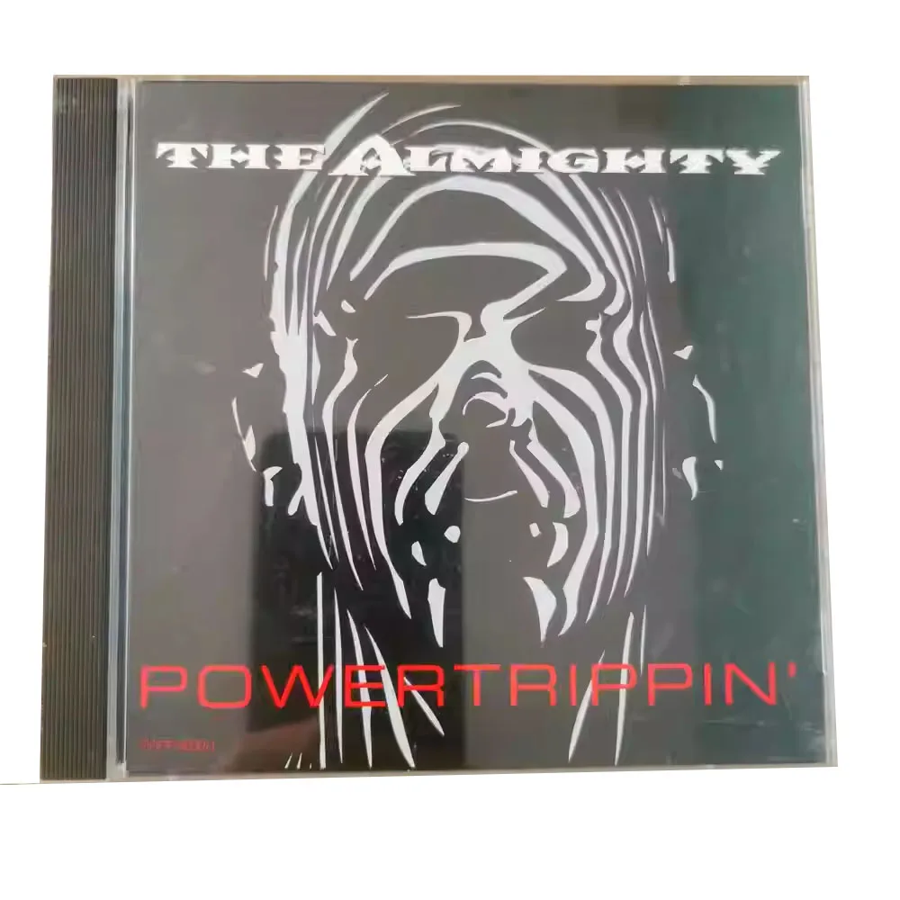 قرص مضغوط The Almighty Powertrippin ألبوم هارد روك/معدني ثقيل تم إصداره فرقة الروك البريطانية The Almighty في عام 1993 #1