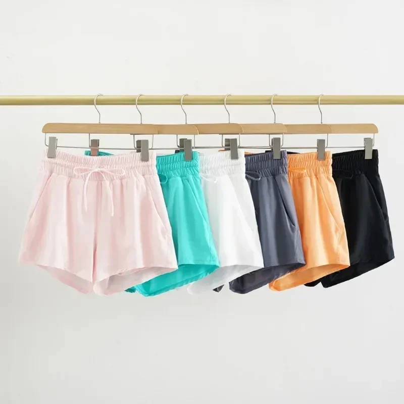 Shorts de corrida com limão médio crescimento forrado para mulheres, shorts esportivos leves com cintura de cordão, bolsos que absorem o suor, secagem rápida, 5 polegadas