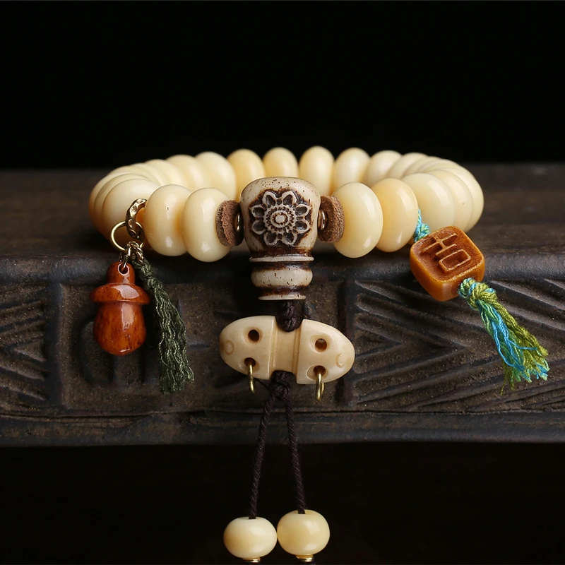 Yak Bone Bead Bracelet With Turquoise Spacers, Three-Way Clasp, And Cloud Pendant Accessories