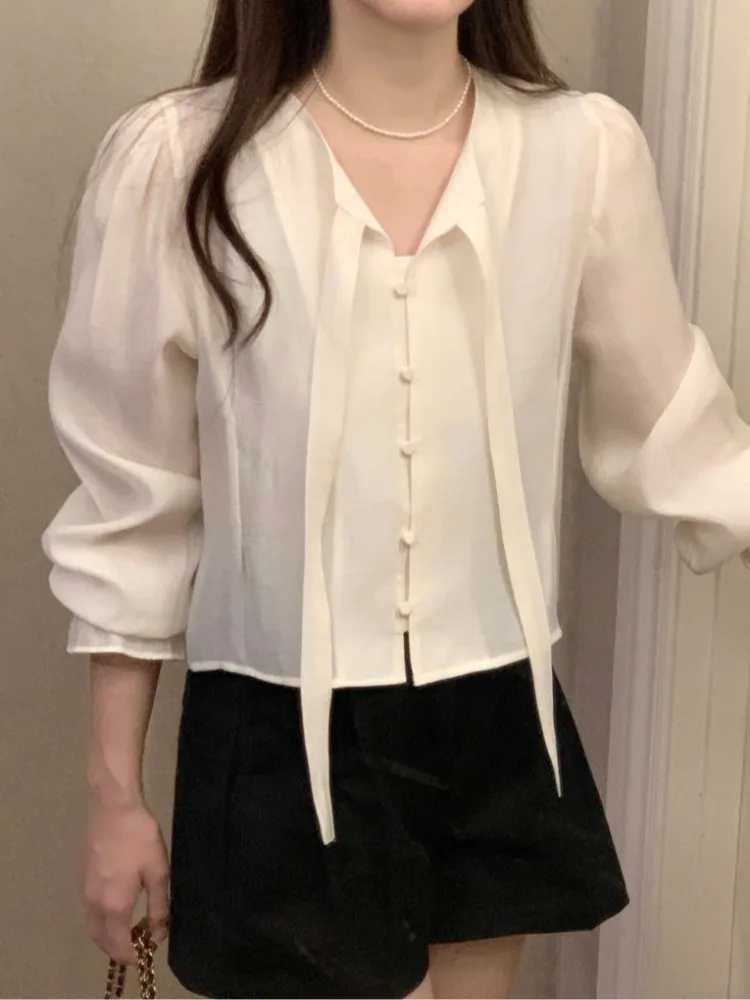 تصميم كوري للنساء ort Sve irt ربيع 2025 جديد Sweet Ele Faionable Bell Sve Top Commute Sle Pure E-commerce