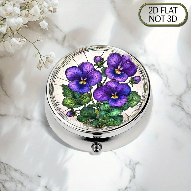 A flat, portable, round metal pill box with a white base decorated with three shades of violet stained glass-style patterns, suitable for organizing medication, vitamins, and other items. It is an ideal gift for Father's Day or summer travel activities, featuring a flat design