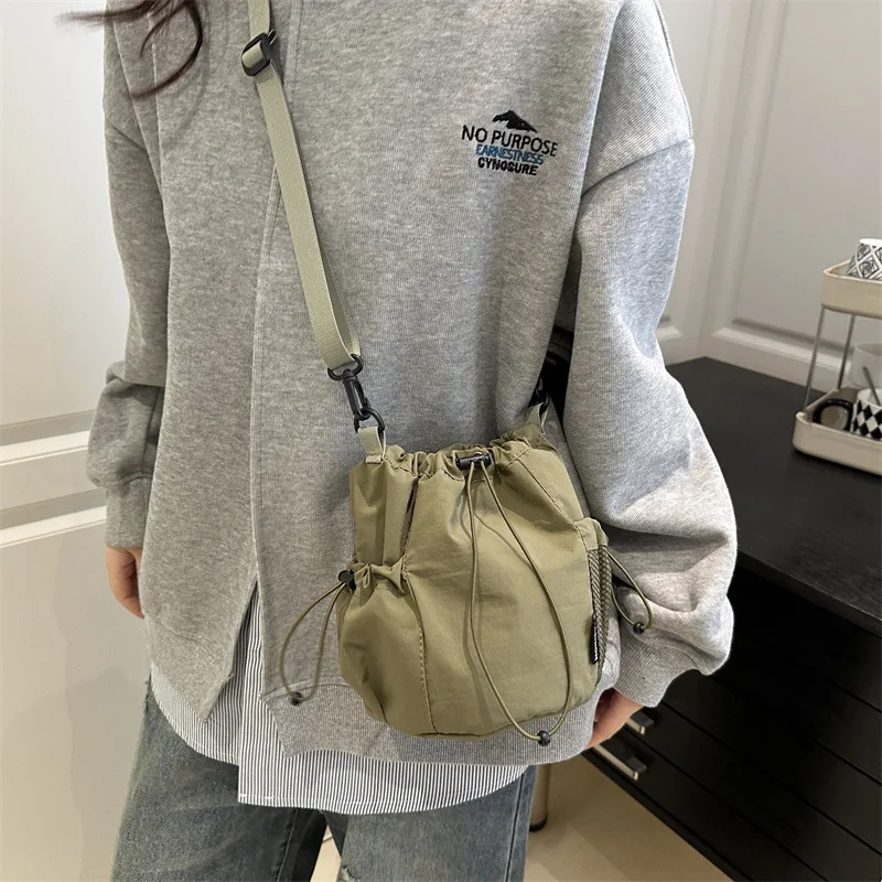 

Japanese Niche Design Drawstring Bucket Bag Outdoor Sports and Casual Bag Messenger Bag Woman Fashion Crossbody Bags