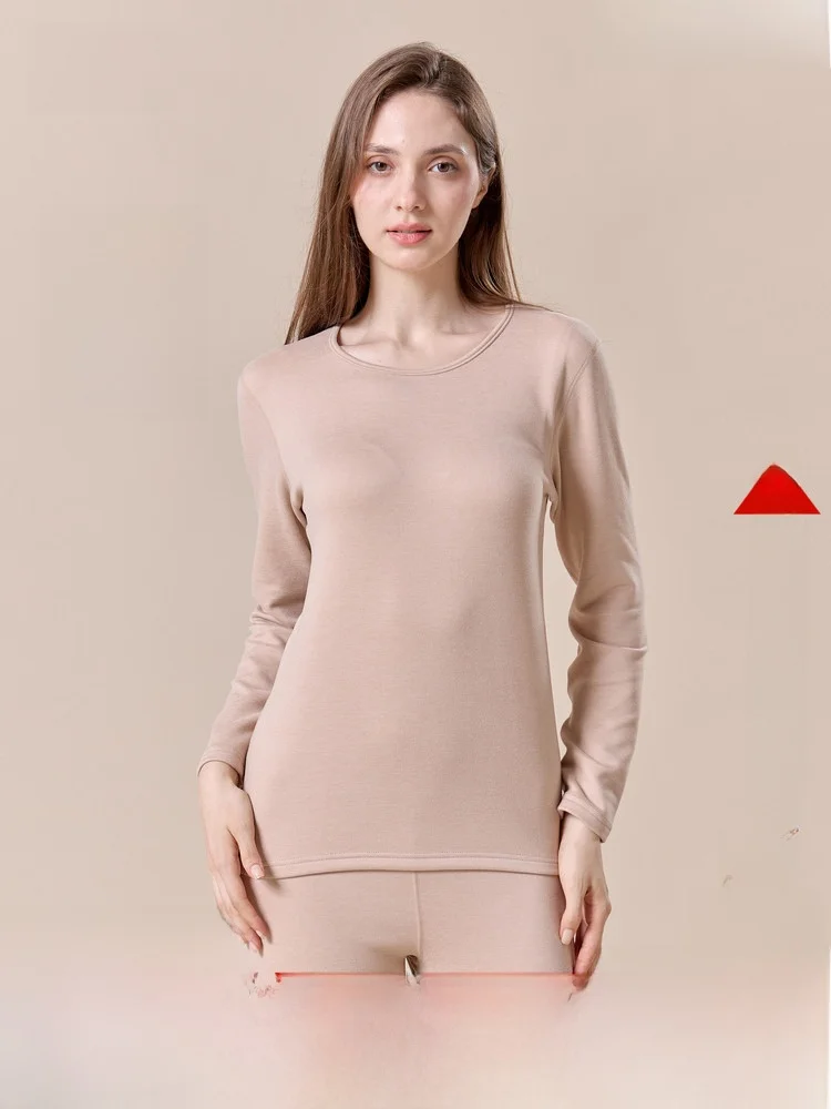 

Теплый, комфортный, приятный для кожи однотонный комплект женского нижнего белья из шерсти и шелка: топ с круглым вырезом и длинными рукавами, длинные брюки из полиэфирного волокна.