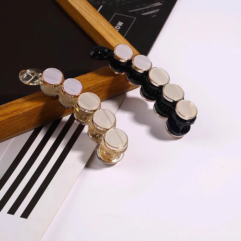 

Women's vertical ponytail hair clip for thick hair at the back of the head