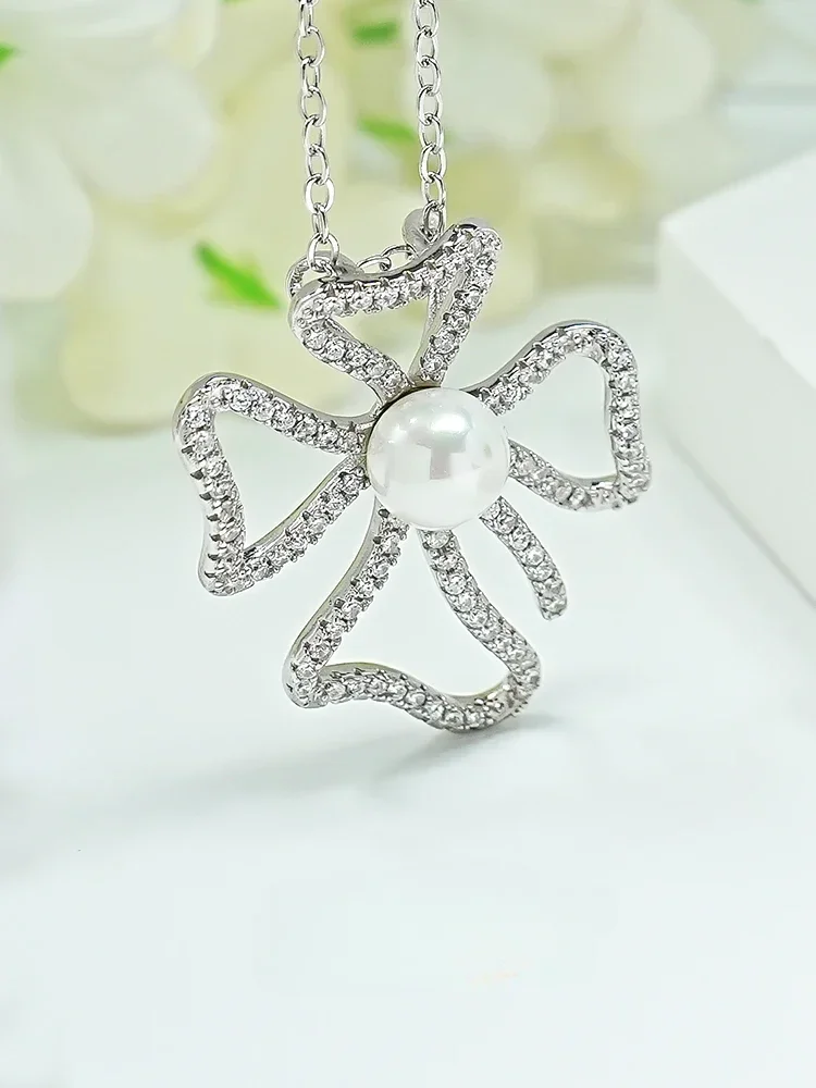 

Fashionable and Luxurious Niche Design: Beimu Pearl Butterfly High Carbon Diamond 925 Silver Simple Pendant Wedding Jewelry