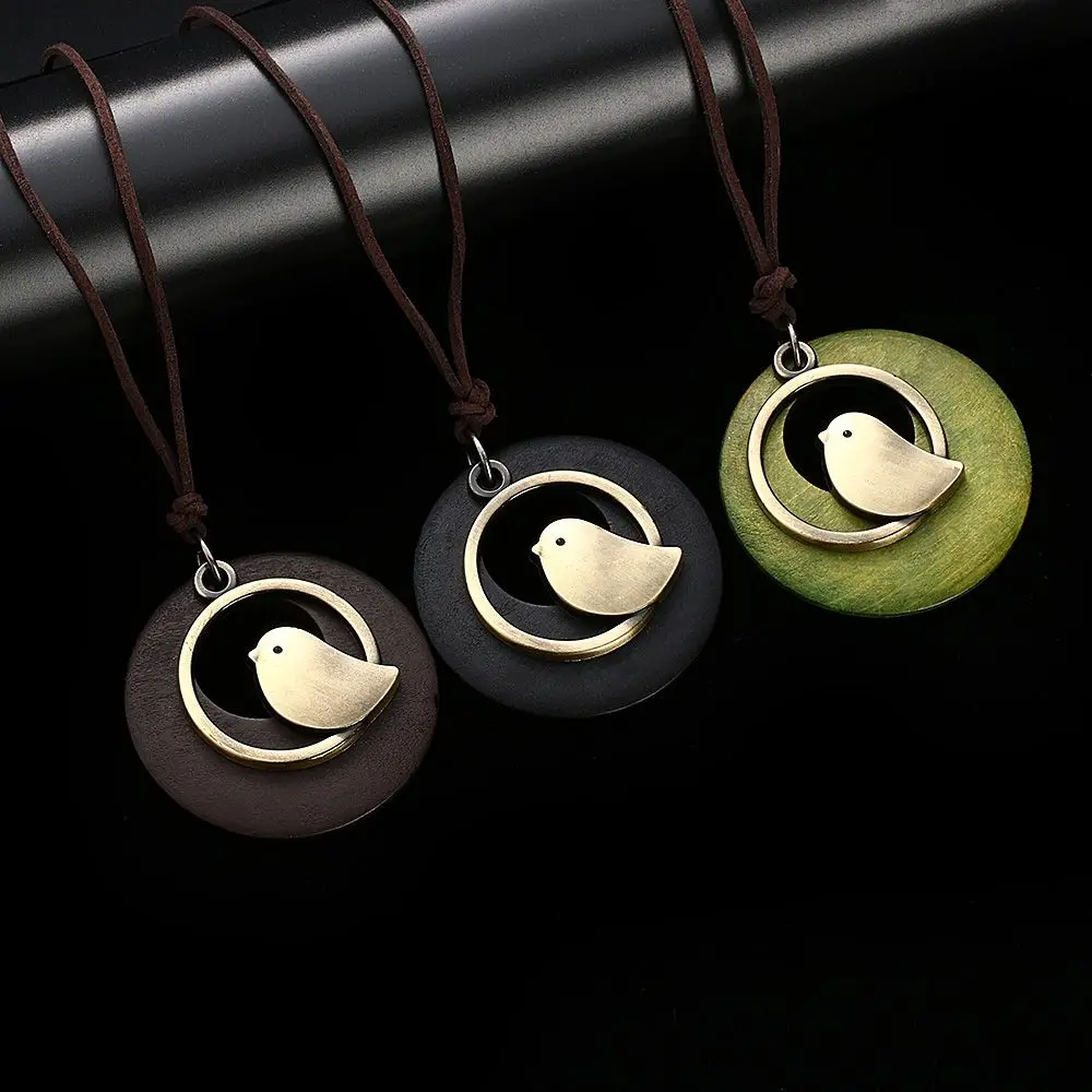 Vintage Wooden Bird Pendant Necklaces Boho Ethnic Style Metal Hollow Necklaces Retro Long Sweater Chain Rope Jewelry for Women