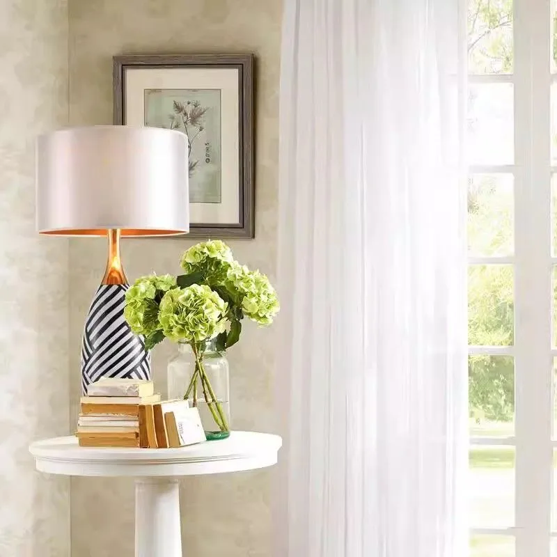 

Modern American Minimalist Brushed Brass Ceramic Creative Table Lamp for Bedroom Nightstand Model Home Decor Lighting LED