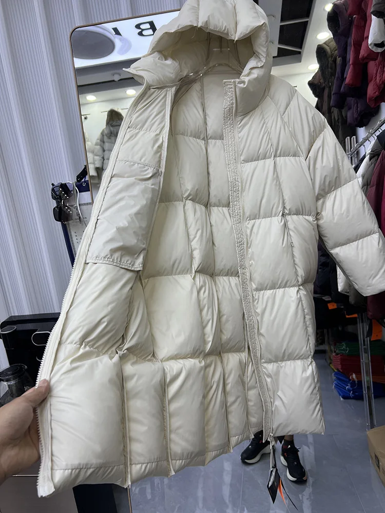 2025 inverno nuovo piumino da donna tinta unita semplice e versatile stile lungo con cappuccio sciolto piumino d'anatra bianca