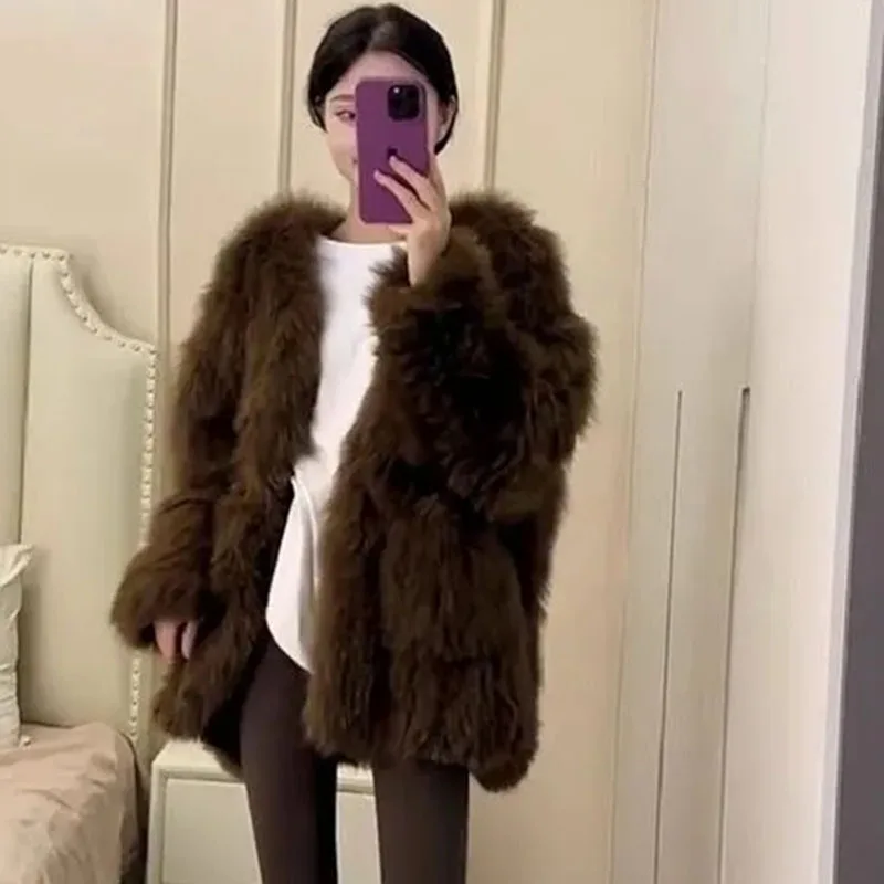 Chaqueta de felpa de manga larga para mujer europea, abrigo de piel sintética de Color sólido a la moda para mujer, prendas de vestir de piel de alta gama para Otoño e Invierno 2025