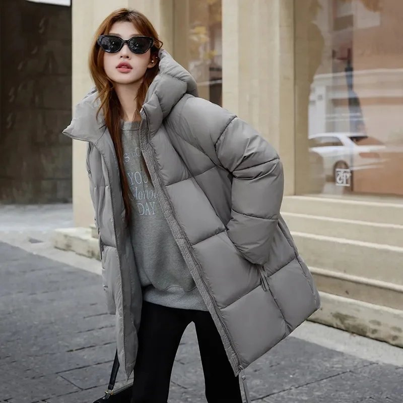 Lange Daunenjacke Frauen Parkas 2025Winter Neue Warme Baumwolle Gefütterte Mantel Damen Lose Windjacke Overwear Mit Kapuze Baumwolle Jacken Top