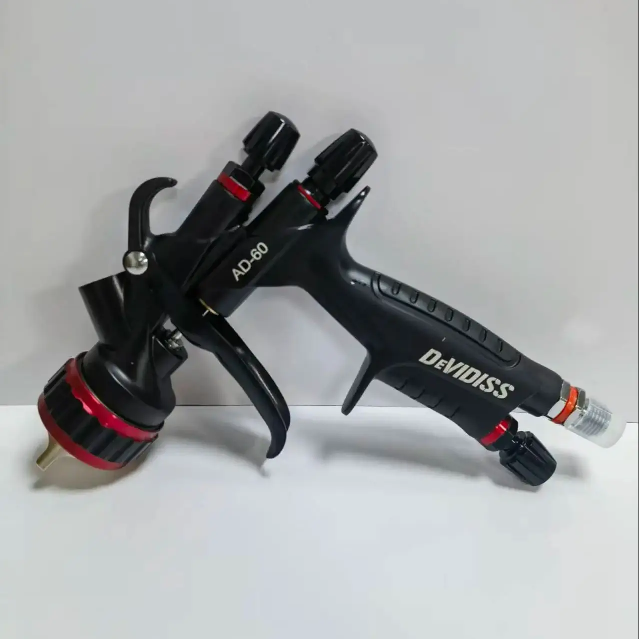 

Bestseller DEVIDISS GTI Pro TE20 Spray Gun Nozzle 1.3mm With 600CC Mix Tank And Adpater Car Paint Gun Varnish Paint Sprayer HVL