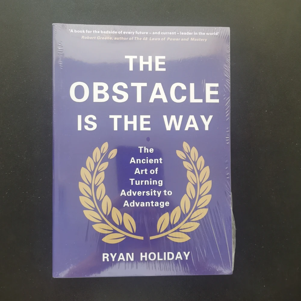 

The Obstacle Is The Way The Ancient Art of Turning Adversity To Advantage By Ryan Holiday in English Paper Book