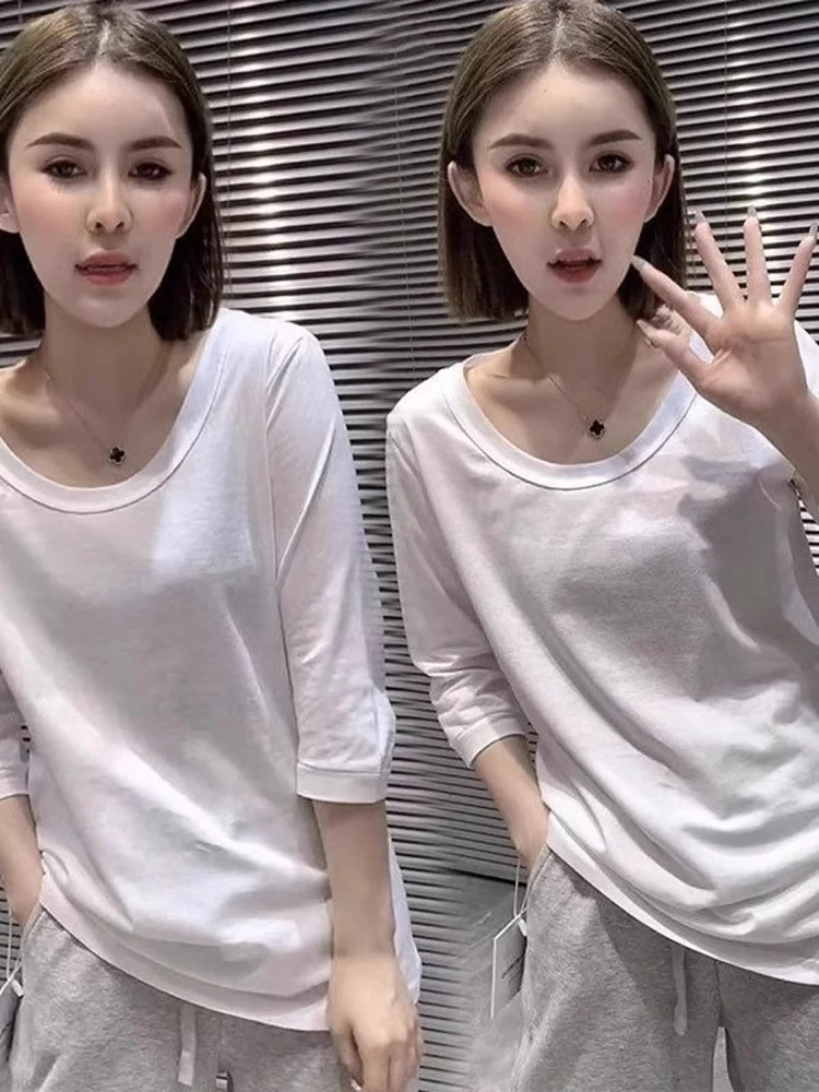 

Женская летняя футболка больших размеров (до 136 кг), свободного кроя, с рукавом 7/8, модная, базовая, в корейском стиле, из полиэстера.