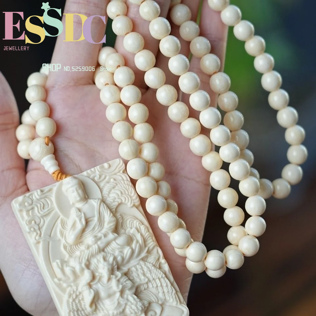 Original hand-carved mammoth ivory pendant brand with eight guardian gods and twelve zodiac signs sheep and monkey.