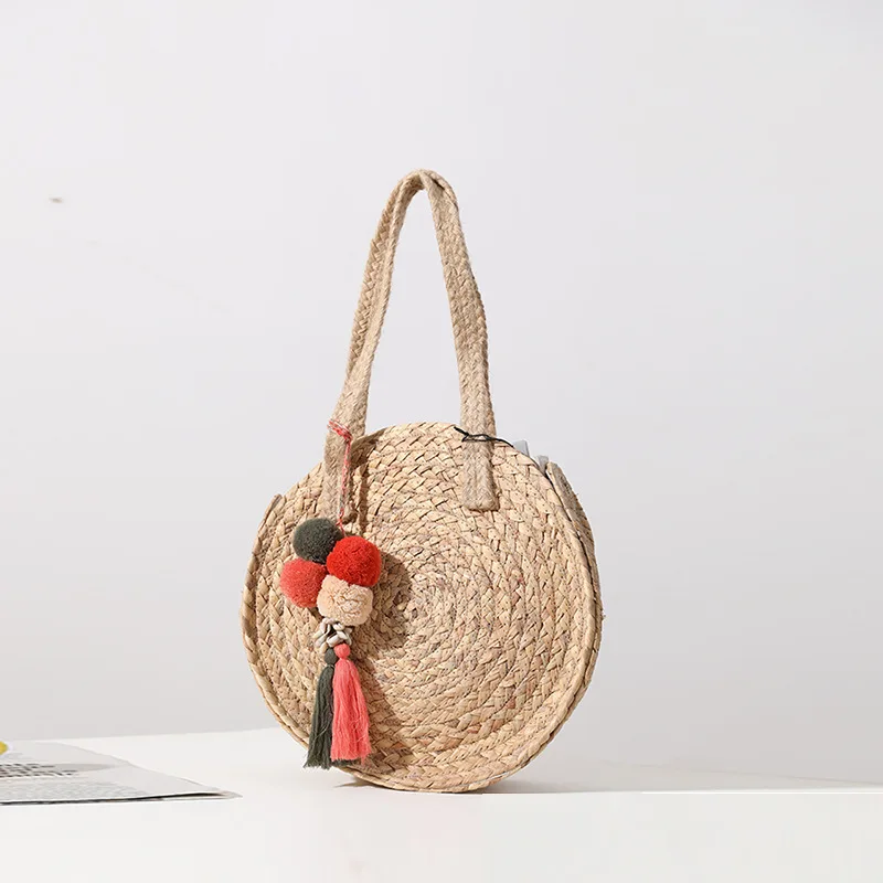 New Cute Hair Ball Straw Woven Bag Large-Capacity Round Niche Design Woven Bag Women's One-Shoulder Hand-Held Beach Bag