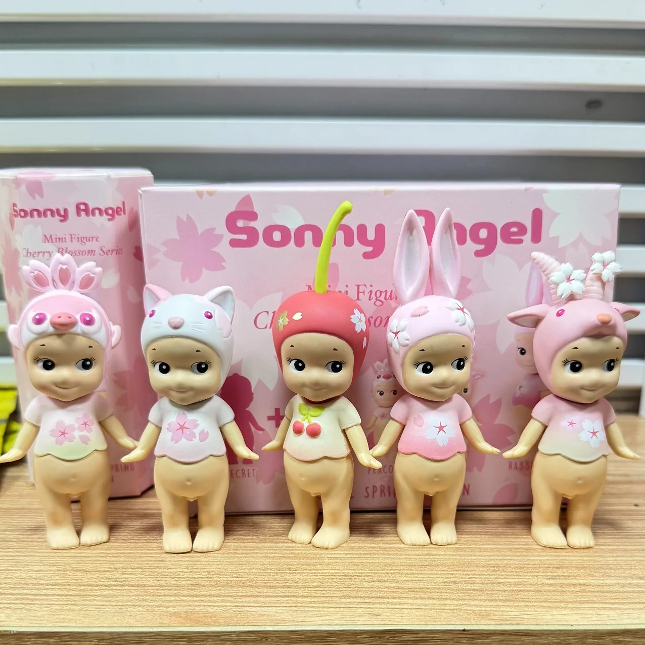 

New Angel Mini Figure Cherry Blossom Series Blind Box Rabbit Calico Cat Goat Peacock Hidden Peaceful Spring Edition Ornaments