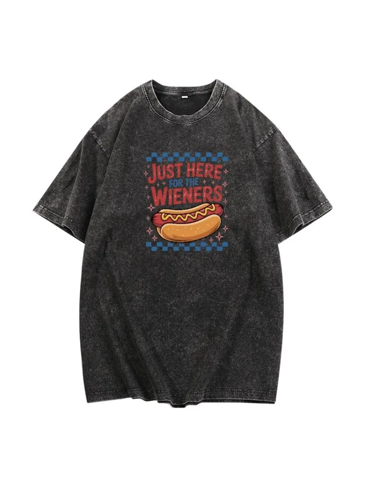 Retro - styled washed T - shirt featuring a humorous hot dog design: “JUST HERE FOR THE WIENERS