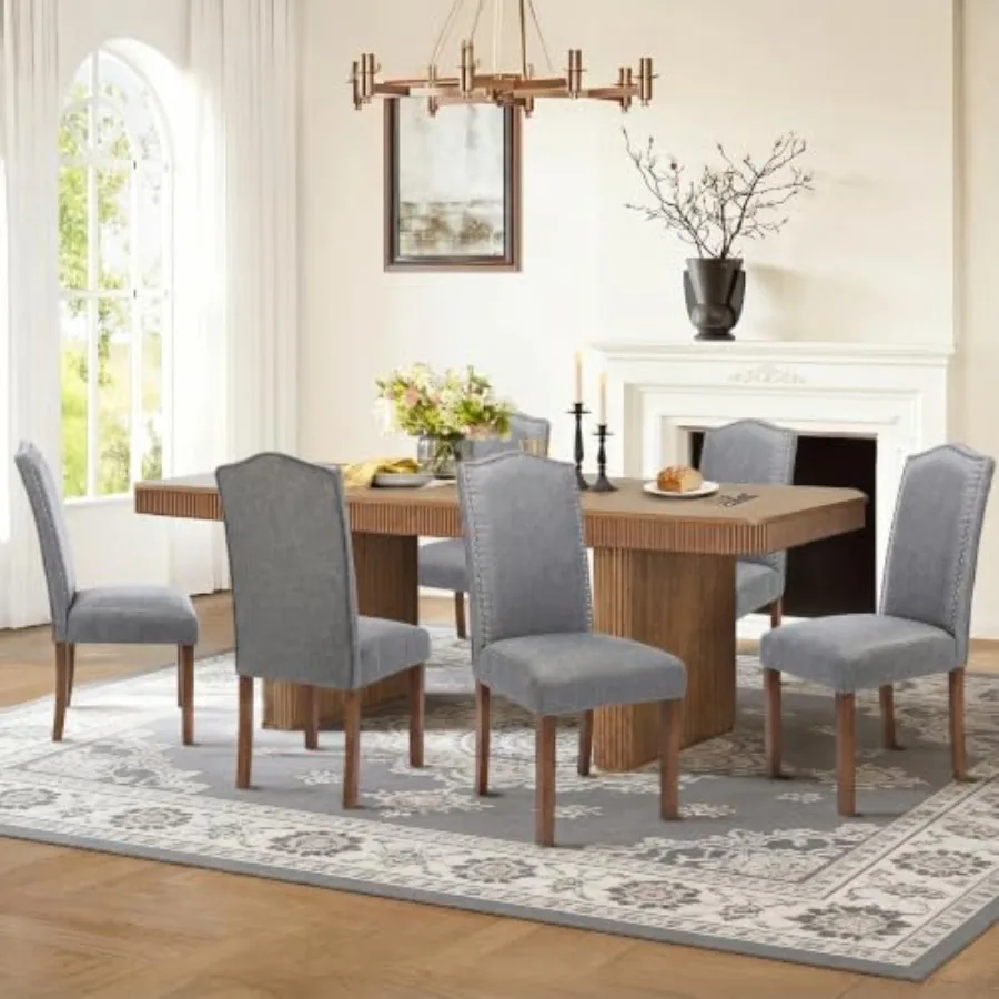 Upholstered dining chair for modern kitchen diner: fabric seat, gray color, ergonomic design and padded comfort