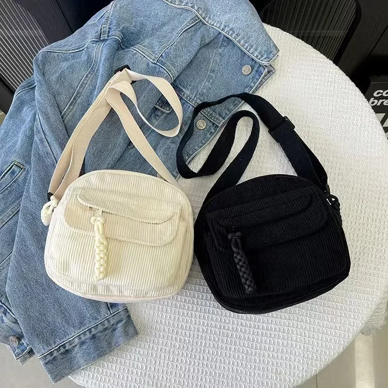 A stylish little square women's bag made of corduroy, available in various colors