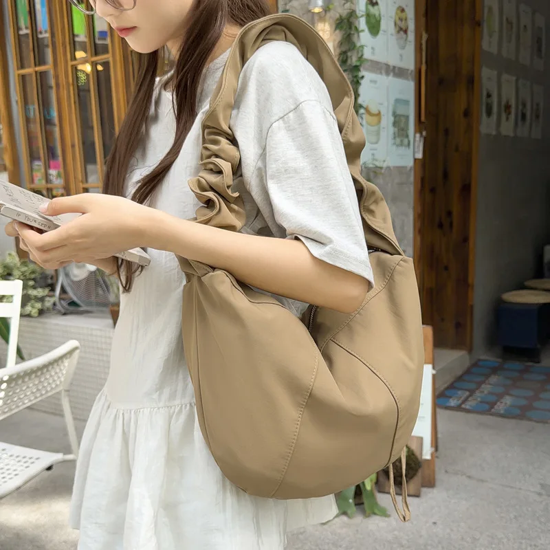 2026New minimalist, large-capacity shoulder bag for women, suitable for daily commuting, casual use, and can be carried as a tot