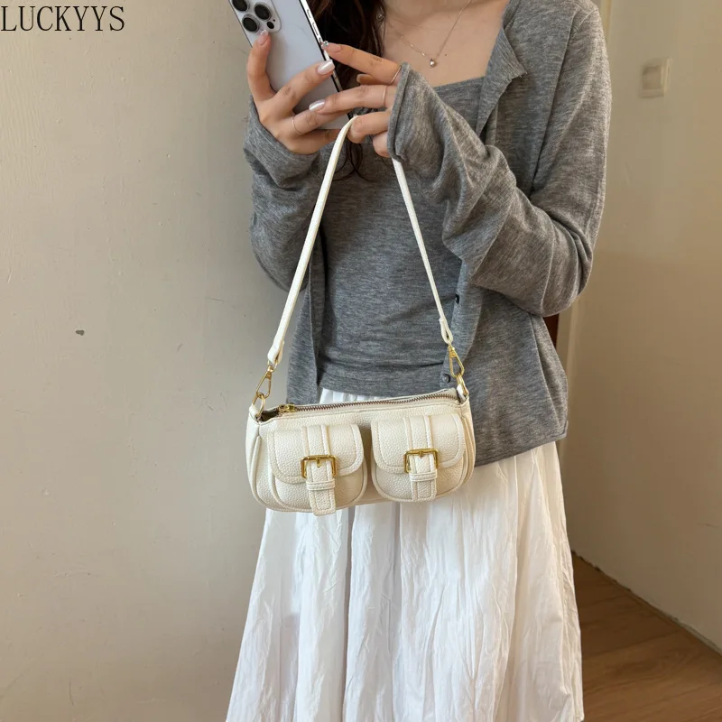 Cross-border Locomotive Wind Multi-pocket Portable Shoulder Armpit Bag Casual Large-capacity Bag 2026 Summer New Women's Bag