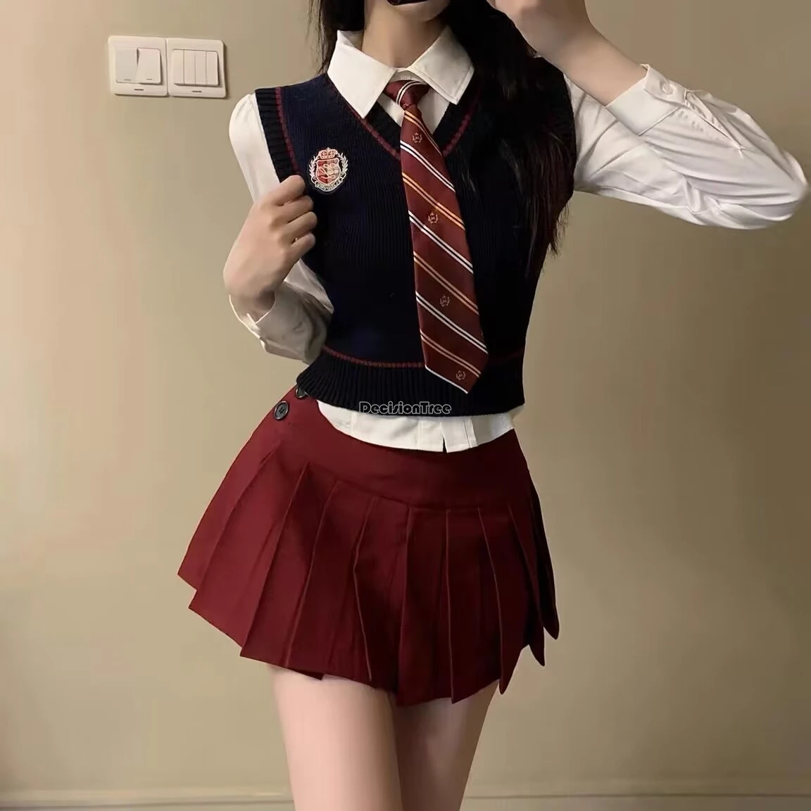 Gilet tricoté de style collégial coréen, demi-jupe, ensemble court à manches longues, nouvelle mode amincissante jk, ensemble 3 pièces, printemps automne 2025