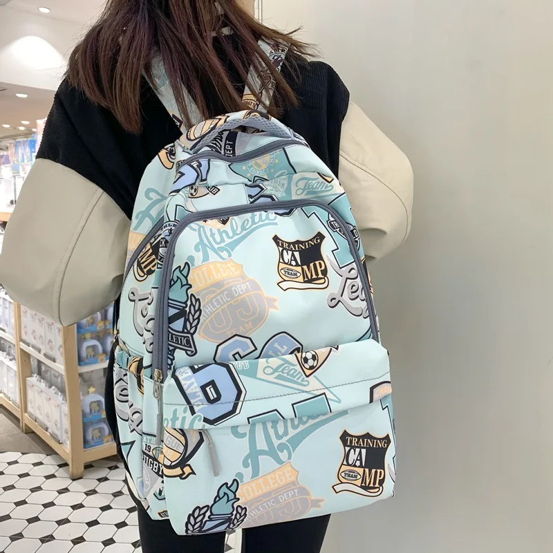 Zaino doppio di tendenza muslimtrend da uomo e da donna di marca originale di grande capacità Graffiti Mochilas Para Mujer vendita calda