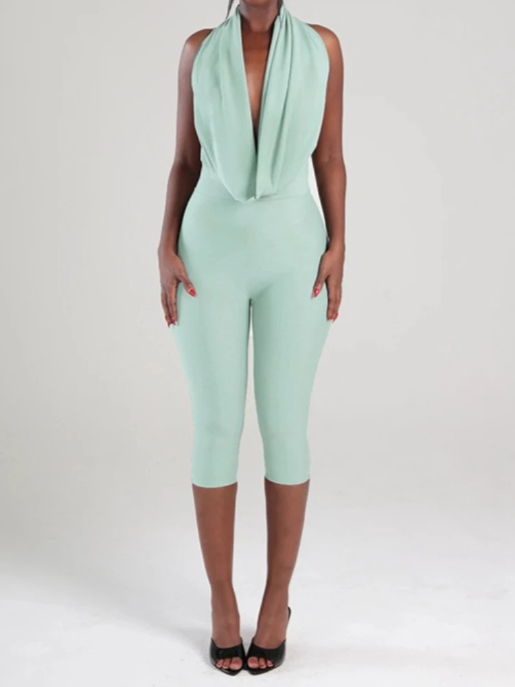 Foamlina Sexy Backless Jumpsuit Damesmode Effen Diepe V-swingende kraag Mouwloos Vetersluiting Slanke Capri-broek Club Party Romper