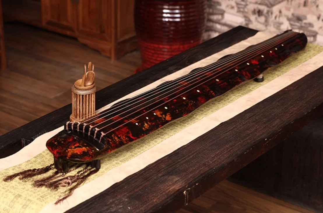 

Guqin Banana leaf type Laoshanmu Cinnabar red Professional performance Chinese stringed instruments