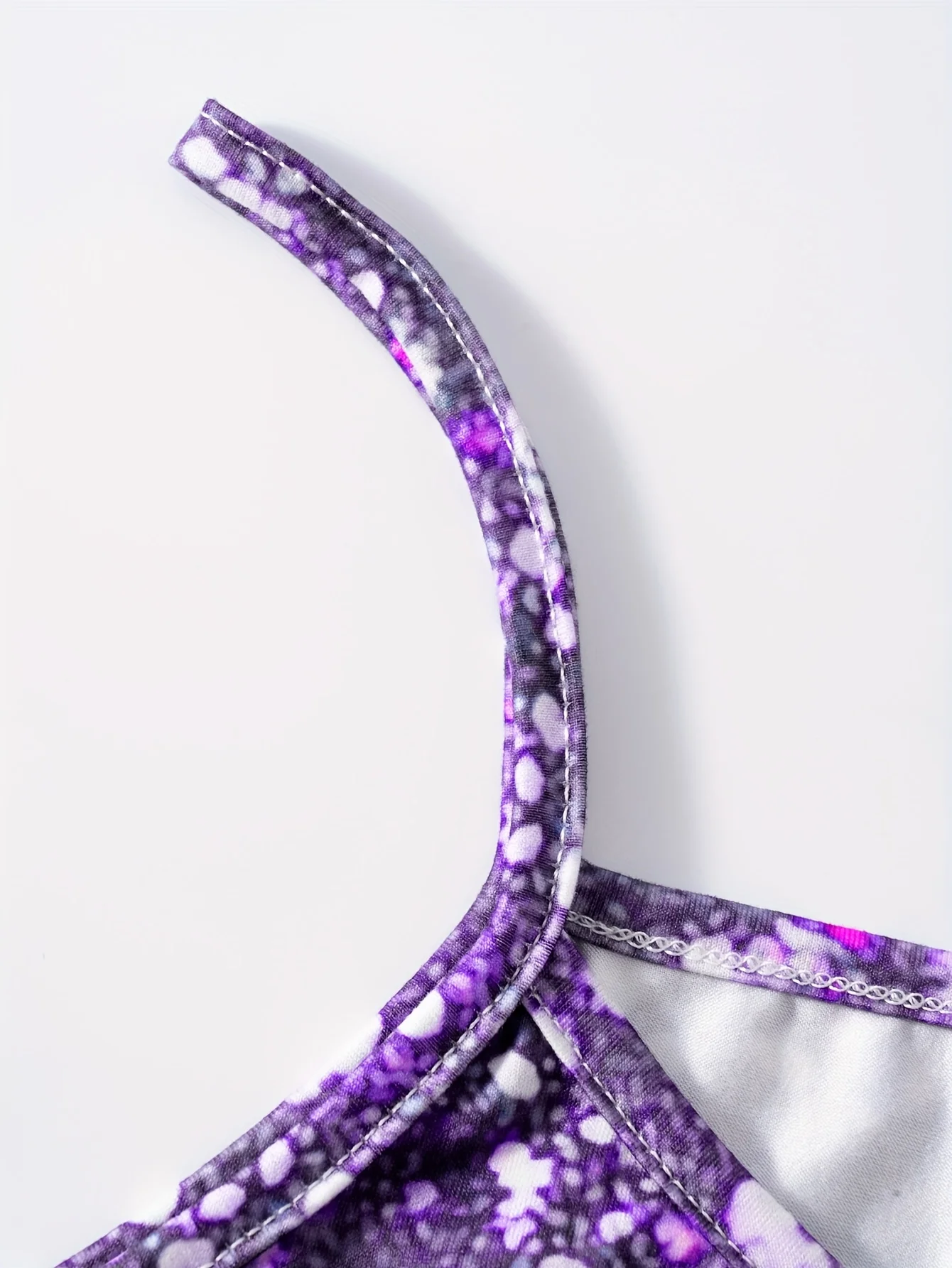 This round neck spaghetti strap maxi dress features a dazzling purple glitter butterfly print on a sleek black base. Soft and fl view 6