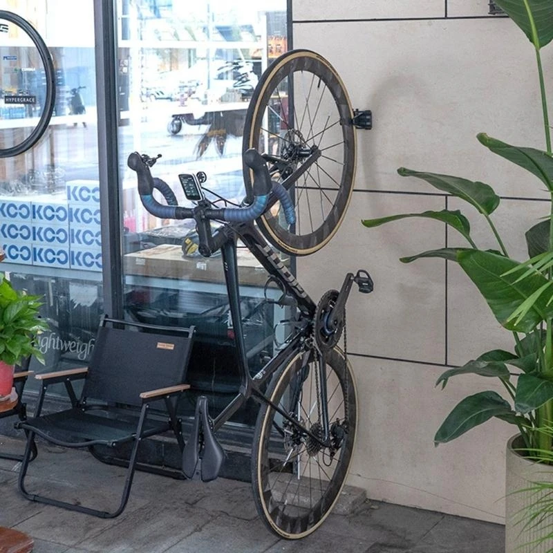 

Велосипедные парковочные пряжки Регулируемая настенная стойка Вертикальные настенные вешалки для велосипеда Фиксированный для