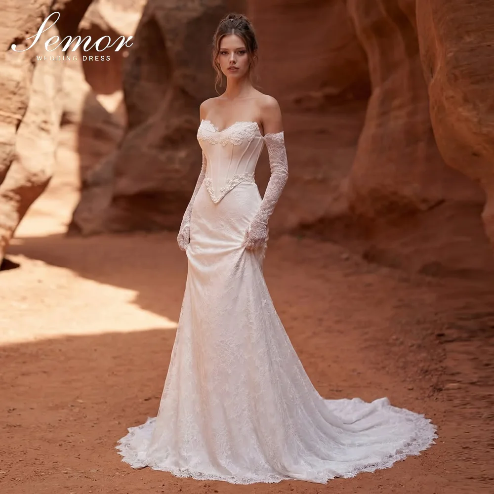 hippie wedding dress NALAWEKER Boho Dresses for Bride Lace Ruffle Sleeves Sexy V-Neck Beach Wedding Gown Long Ivory Size 2 at Amazon Women's Clothing store The lower part of the dress showcases a fit and flare silhouette Hippie Wedding Gowns | Boho