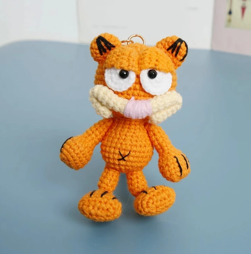 

DIY handmade Garfield doll crocheted wool knitting material bag keychain pendant for friends homemade gifts