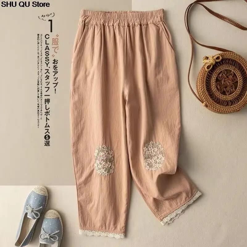 Nuovi pantaloni casual ricamati in cotone e lino pantaloni harem a nove punti in pizzo allentato retrò letterario di nuova moda estiva da donna