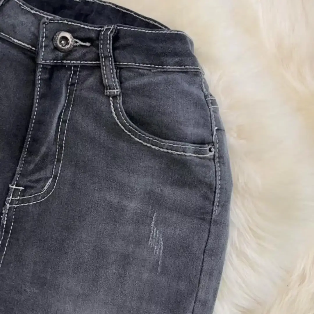 Splicing color fashion temperament flared pants jeans women's high waist slim-fitting elastic slightly pulled pants long pants