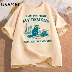 I Am Fighting My Demons Raccoon Meme T Shirts Funny graphic printed t-shirt Men Women Fashion Harajuku Retro T-shirt cotton Top