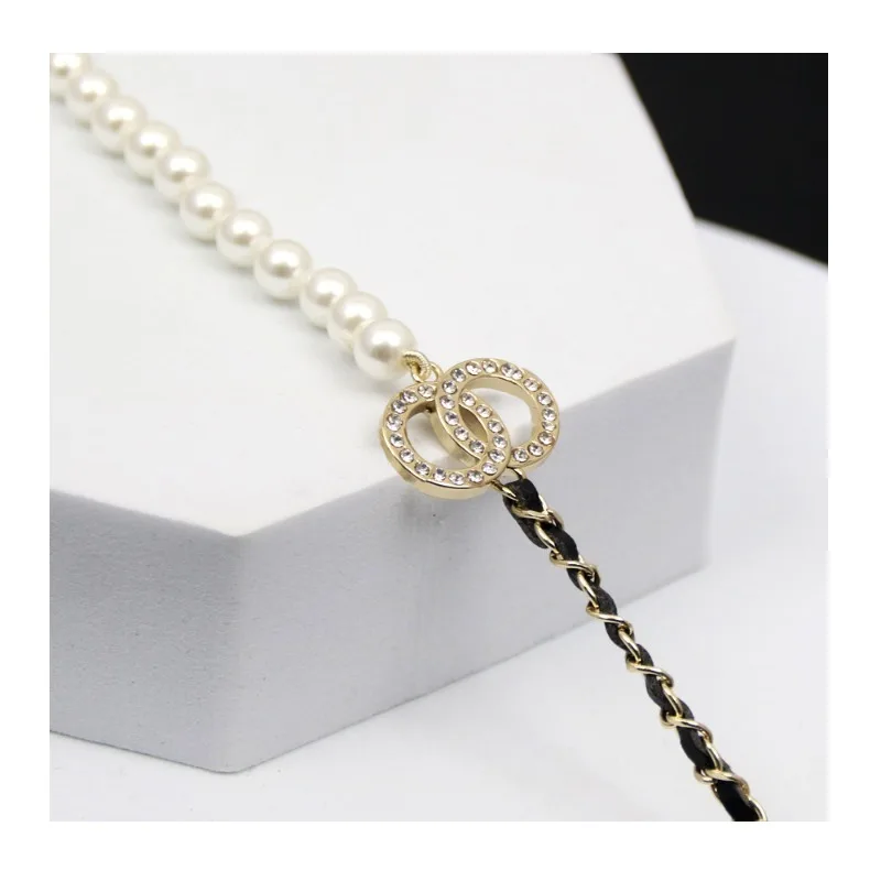 

Новое высококачественное двойное ожерелье Seiko с комбинированными элементами: веревочные и бусинные звенья, инкрустированные бриллиантами, женское, в комплекте с биркой.