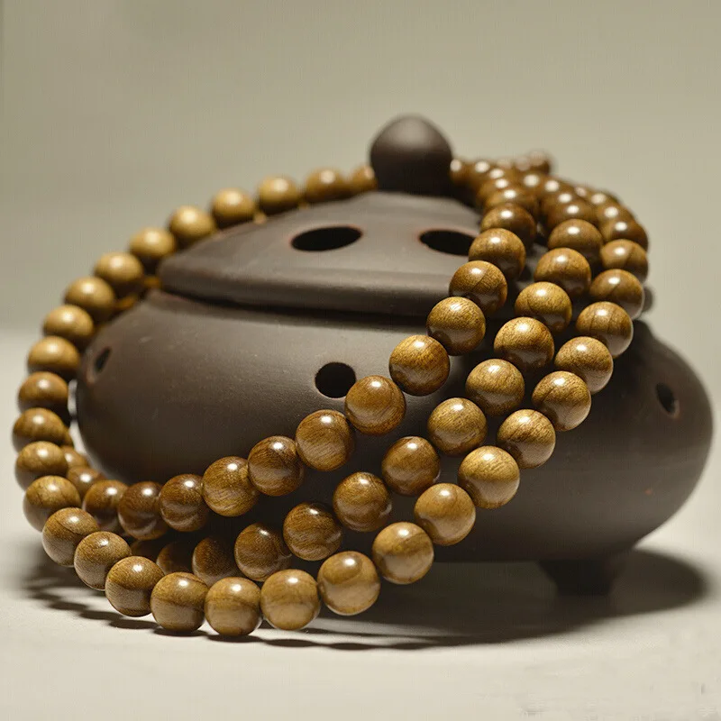 

20mm golden nanmu bracelet, men's Buddhist beads, women's full water ripple dark wood