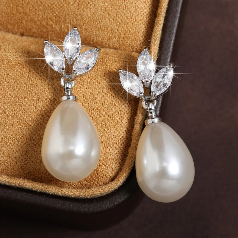 ZAKOL Luxus Wasser Tropfen Imitation Perle Zirkonia Tropfen Stud Ohrringe Für Frauen Mädchen Weiß Kristall Metall Hochzeit Festival Schmuck